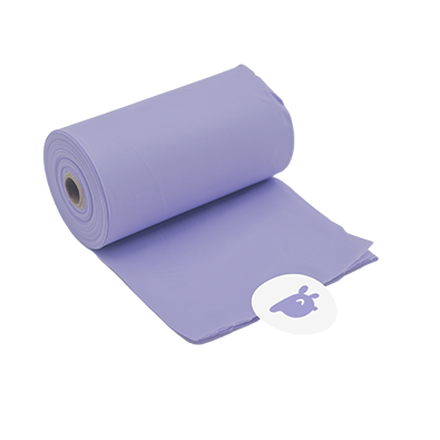 A roll of purple, lavender-scented, compostable dog poop bags, featuring an easy-peel safety sticker.
